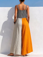 Vibrant Color-Block Jumpsuit – Striped Bodice & Flowing Wide-Leg Pants