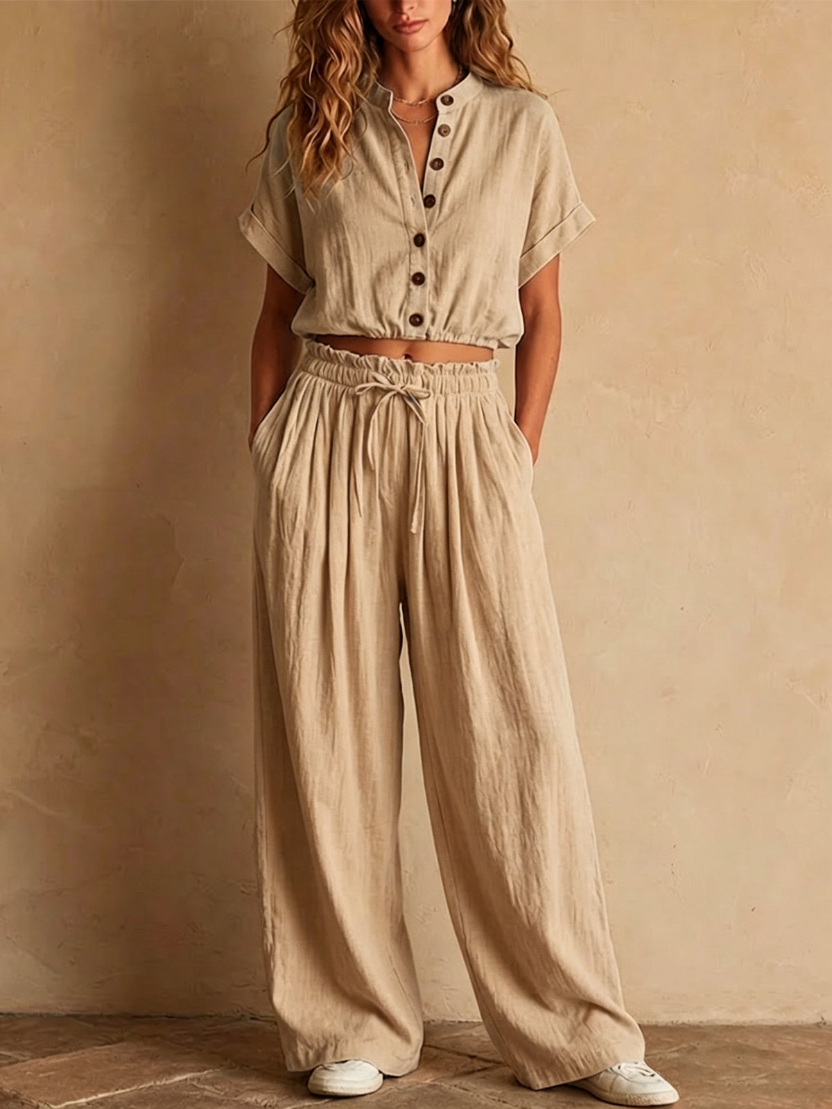 Two-piece Linen Set Featuring A Cropped, Half-button Top With A Stand Collar, Wooden Buttons, And Roll-up Sleeves, Paired With Wide-leg Trousers Featuring An Elastic Drawstring Waist