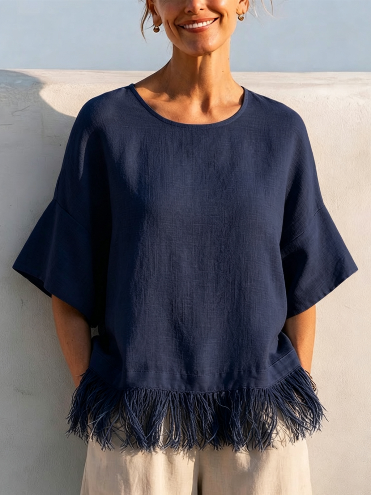 Solid-color Washed Linen Loose-fit Top Featuring A Round Neck, Ruffled Mid-length Sleeves, And A Tassel Hem—designed For A Relaxed, Flattering Fit