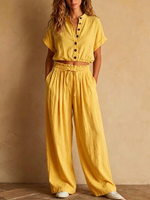 Two-piece Linen Set Featuring A Cropped, Half-button Top With A Stand Collar, Wooden Buttons, And Roll-up Sleeves, Paired With Wide-leg Trousers Featuring An Elastic Drawstring Waist