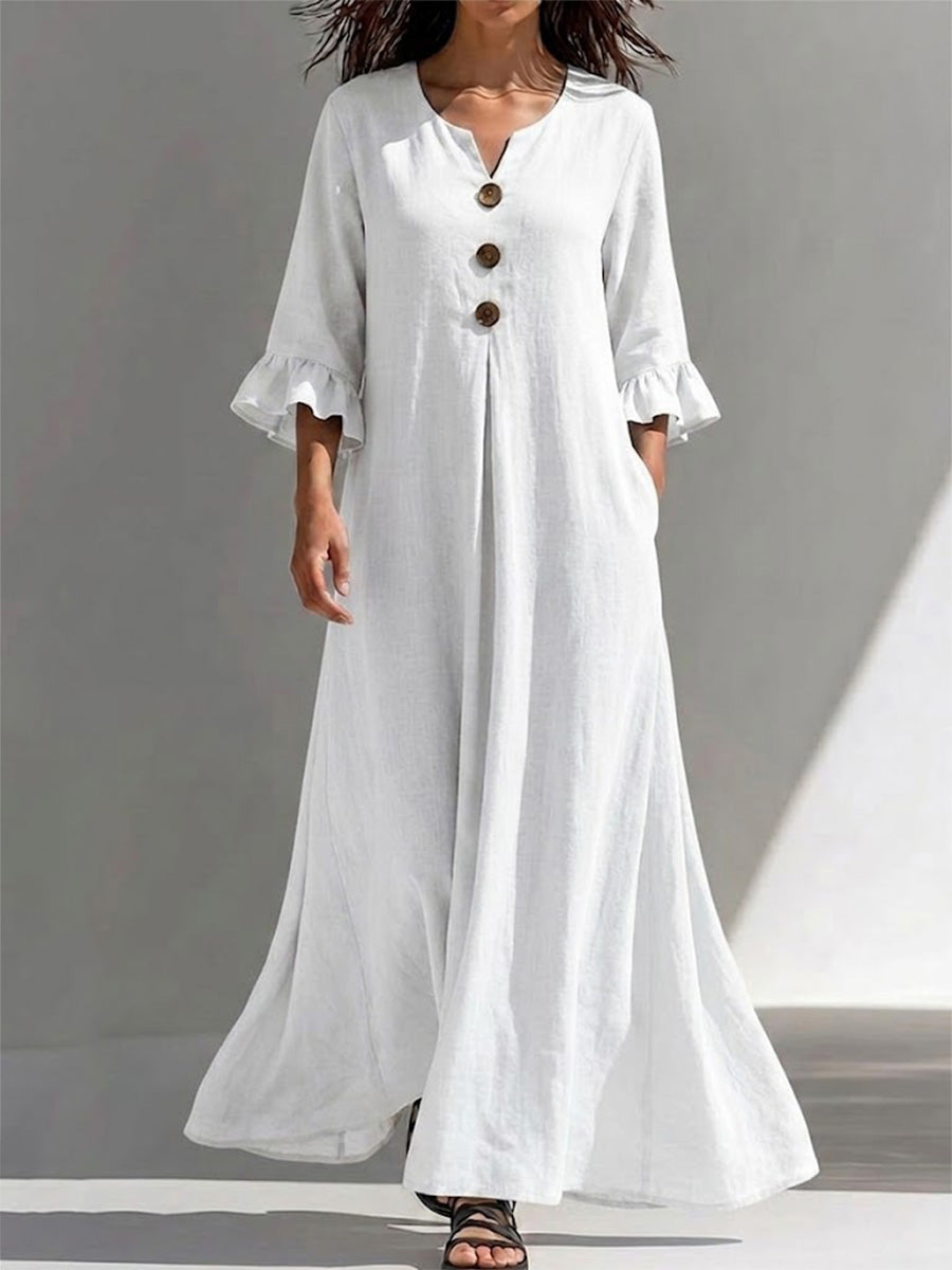Long Dress Featuring A Partial Button-front, Gathered Details, Ruffled Three-quarter Sleeves, And A Flattering, Figure-concealing Fit
