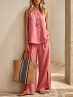 Minimalist, Relaxed-fit Textured Sleeveless Top With Partial Button Placket And Matching Draped, Side-slit Wide-leg Trousers Set