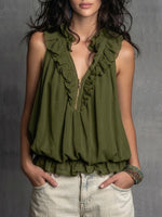 Stylish And Elegant Sleeveless Half-zip Top With A Ruffled Collar.