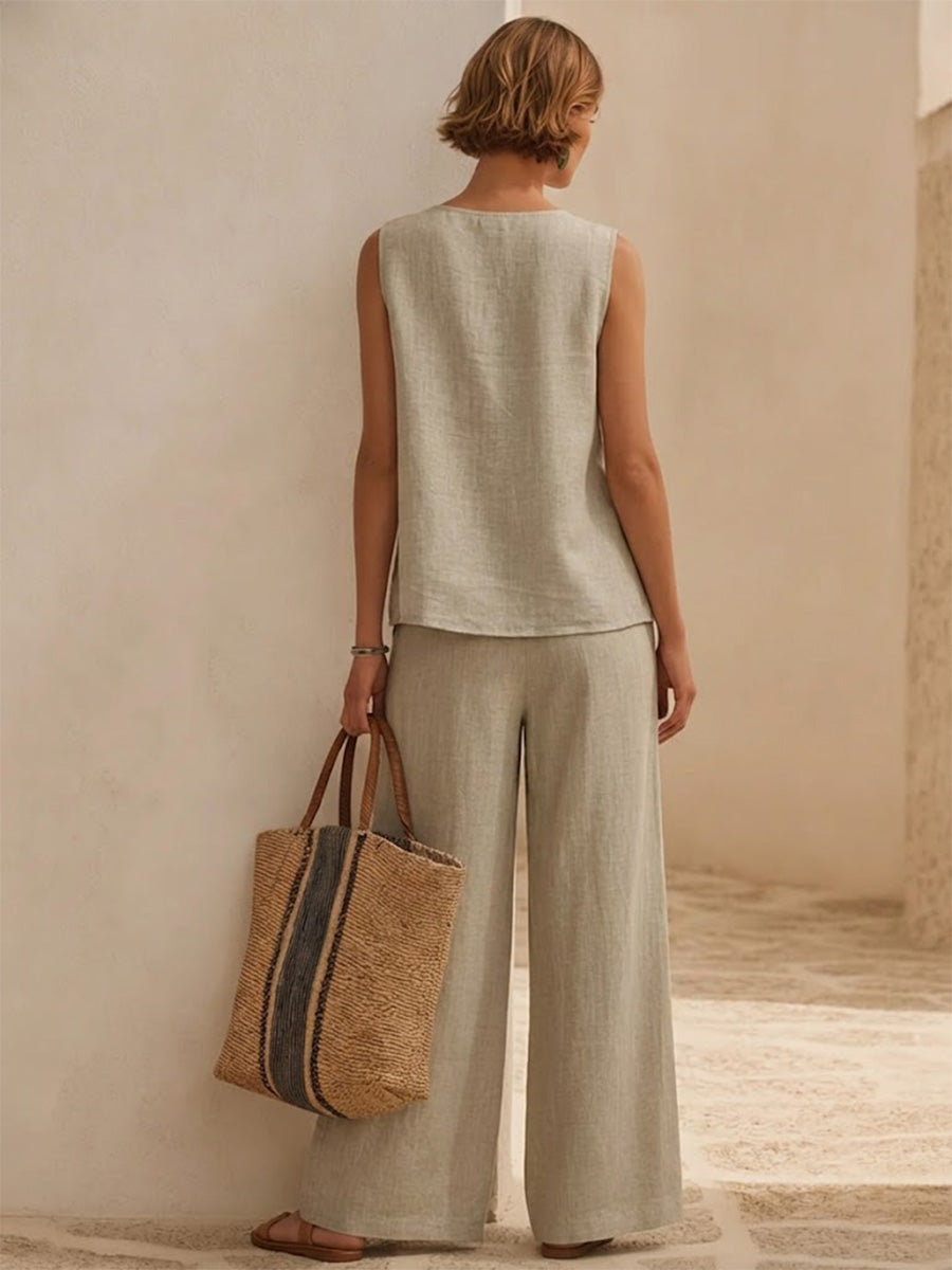 Minimalist, Relaxed-fit Textured Sleeveless Top With Partial Button Placket And Matching Draped, Side-slit Wide-leg Trousers Set