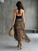Two-piece Set Featuring A Stylish Cotton Halter-neck Sleeveless Top And A Leopard-print Ruffled Chiffon Skirt.